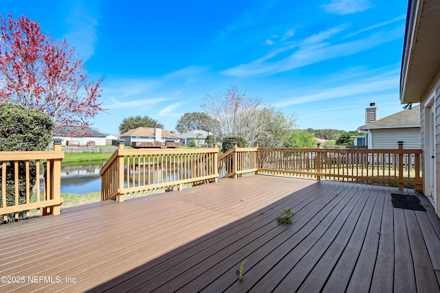 deck featuring a water view