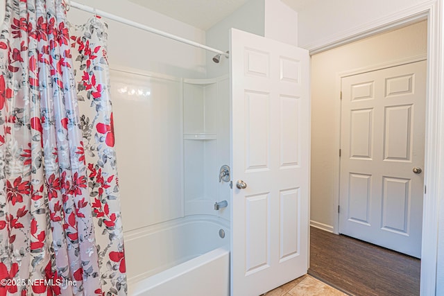 bathroom with shower / bath combo