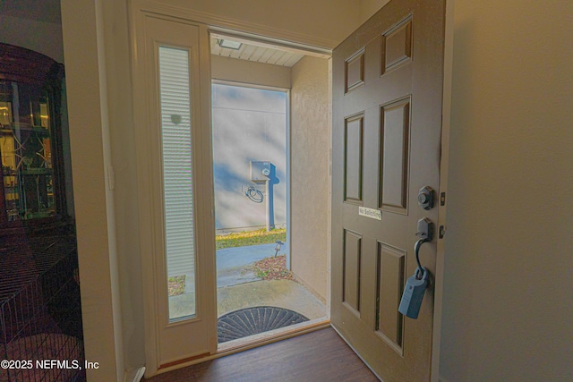 entrance foyer with wood finished floors