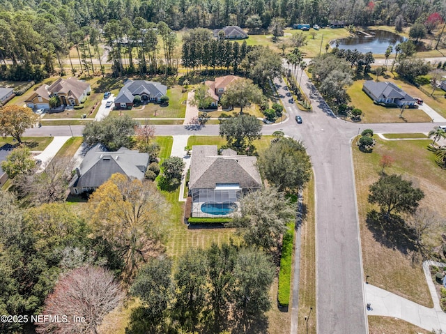 aerial view with a water view and a residential view