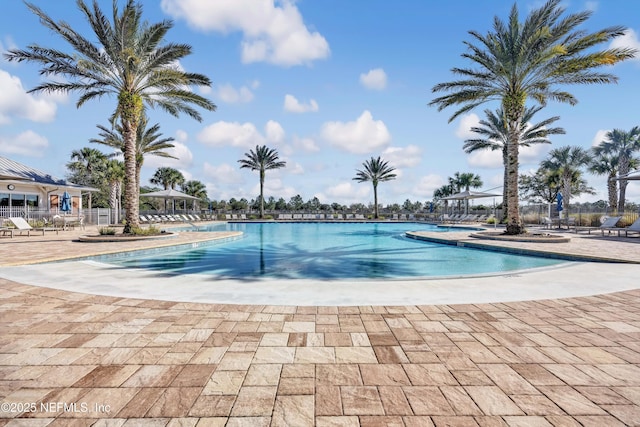 community pool with a patio