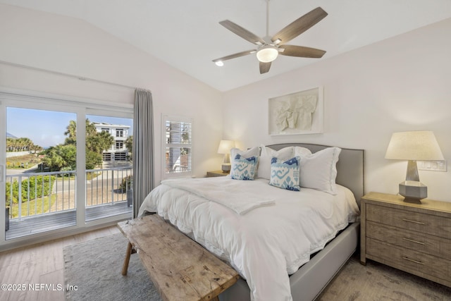 bedroom featuring light wood-style flooring, access to outside, lofted ceiling, and a ceiling fan