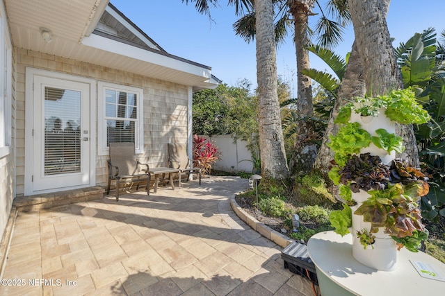 view of patio with fence