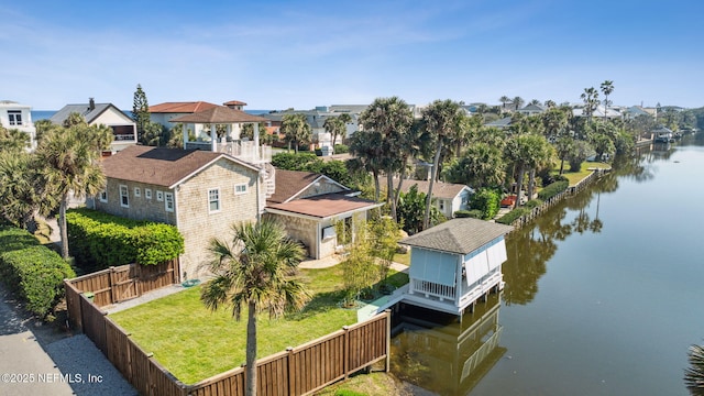 aerial view with a residential view and a water view