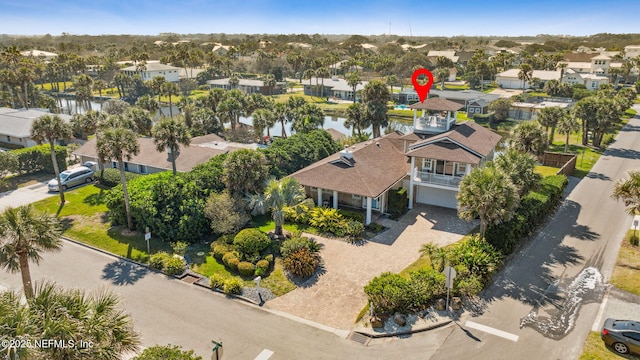 aerial view featuring a residential view and a water view