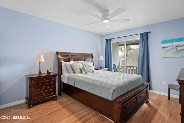 bedroom featuring baseboards, a ceiling fan, access to exterior, a textured ceiling, and light wood-type flooring