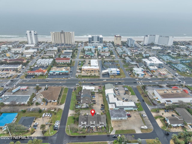 aerial view featuring a water view and a city view