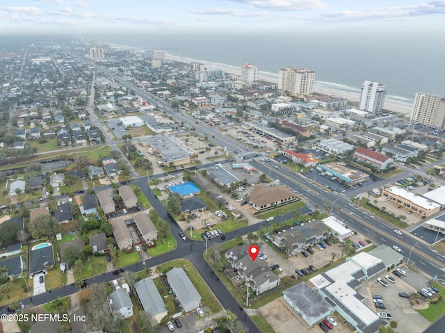 drone / aerial view with a view of city and a water view