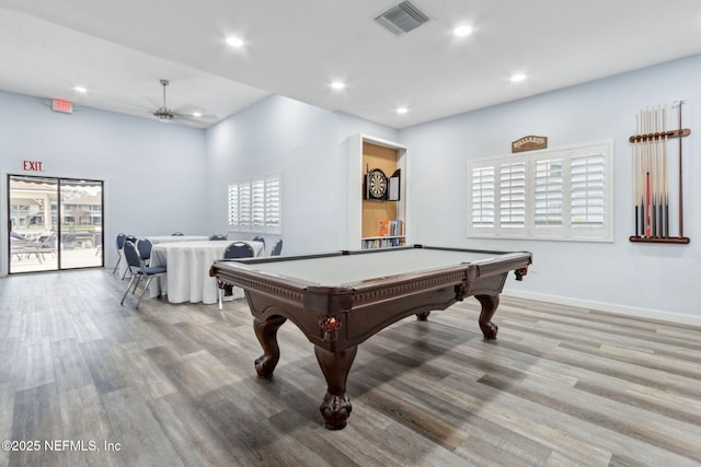 recreation room with a wealth of natural light, light wood-type flooring, visible vents, and recessed lighting