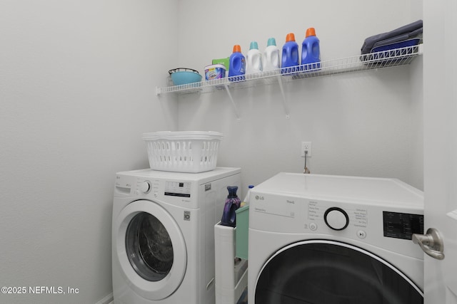 laundry area with laundry area and independent washer and dryer