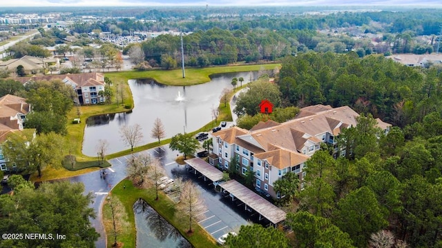 bird's eye view with a residential view and a water view