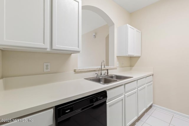 kitchen featuring light countertops, dishwasher, and white cabinetry