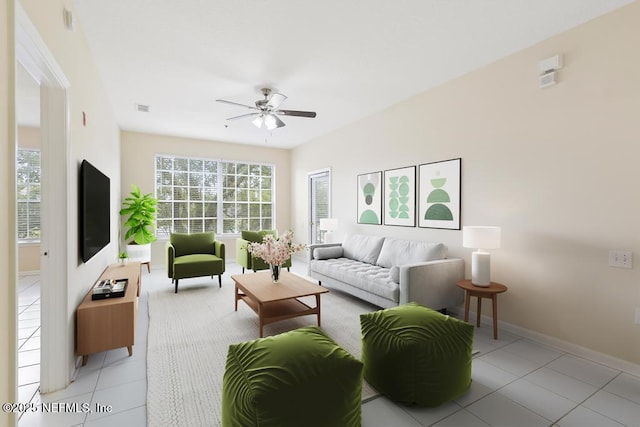 living area featuring light tile patterned floors, baseboards, visible vents, and a ceiling fan