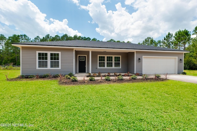 single story home featuring a garage, concrete driveway, and a front yard