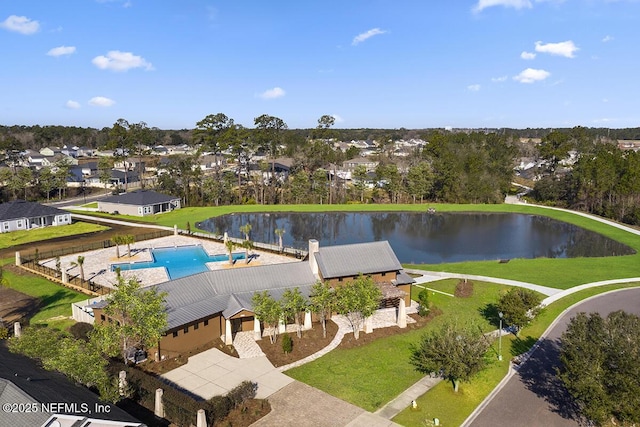 bird's eye view with a water view and a residential view