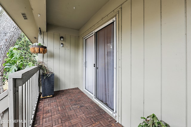 balcony featuring visible vents