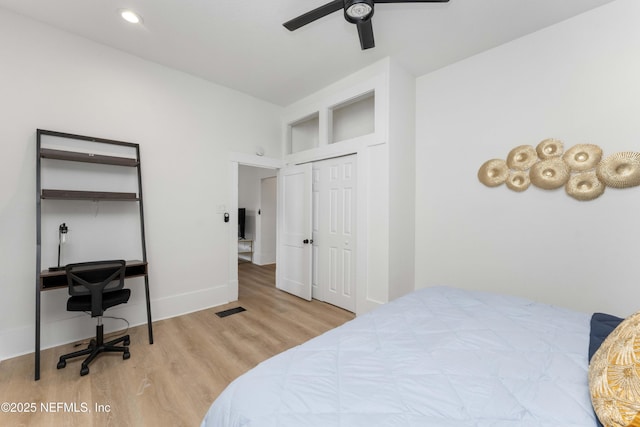 bedroom featuring baseboards, visible vents, ceiling fan, wood finished floors, and recessed lighting