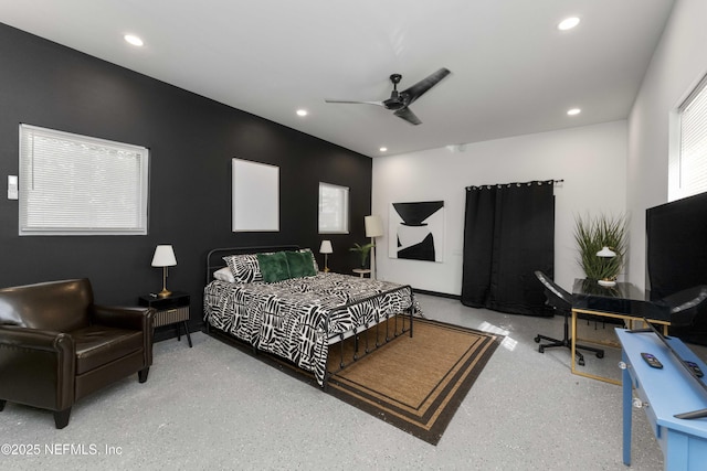 bedroom with a ceiling fan and recessed lighting