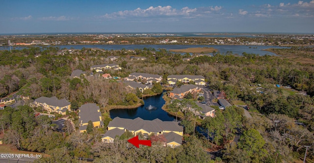 birds eye view of property with a residential view and a water view