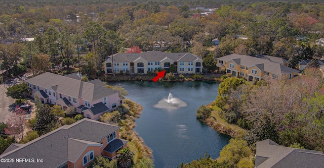 bird's eye view with a residential view and a water view