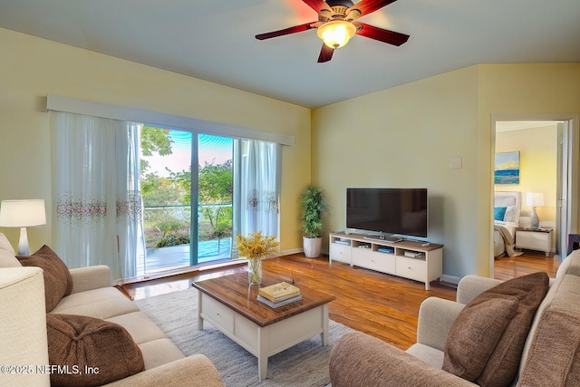 4604 Serena Cir, Saint Augustine, FL 32084 - living area with baseboards, a ceiling fan, and wood finished floors