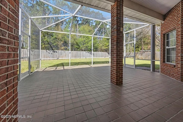 view of patio / terrace with a lanai and a fenced backyard