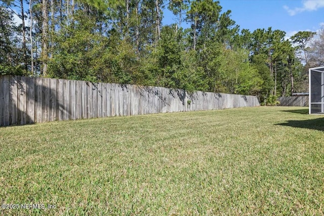 view of yard featuring a fenced backyard