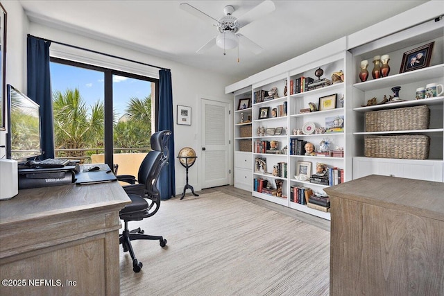 office with ceiling fan and wood finished floors