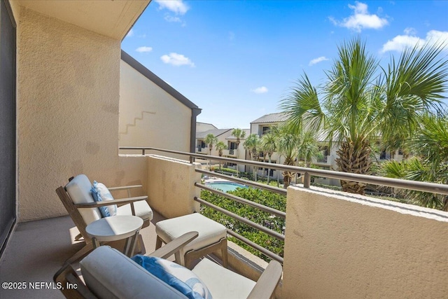 balcony featuring a residential view