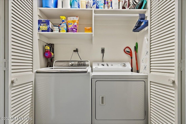 laundry area with laundry area and washing machine and clothes dryer