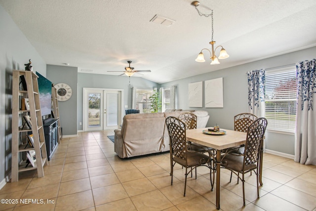 dining area with baseboards, visible vents, a textured ceiling, and light tile patterned flooring