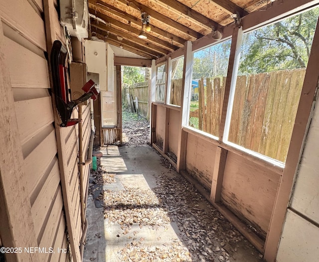 exterior space with lofted ceiling