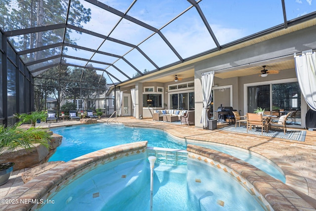 view of pool featuring outdoor dining area, outdoor lounge area, a pool with connected hot tub, a ceiling fan, and a patio area