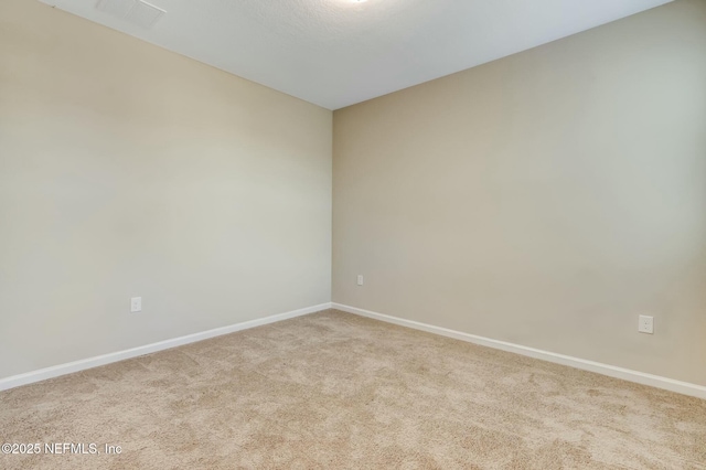 454 Pine Bluff Dr, Saint Augustine, FL 32092 - unfurnished room with baseboards and light colored carpet