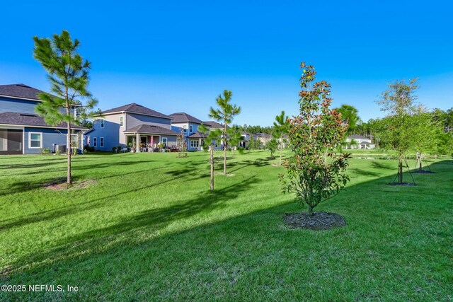 454 Pine Bluff Dr, Saint Augustine, FL 32092 - view of property's community featuring a lawn and a residential view