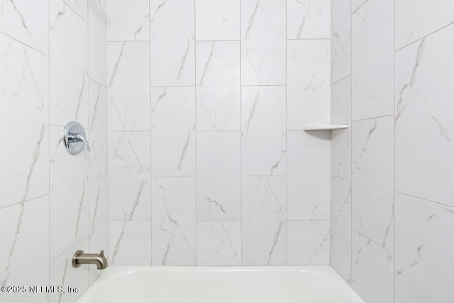 bathroom featuring tub / shower combination