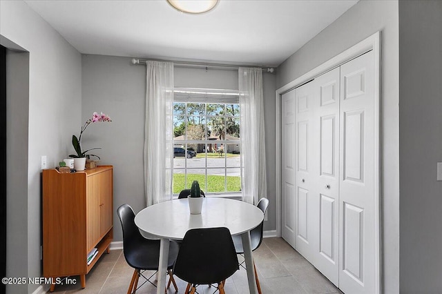 dining room with light tile patterned floors