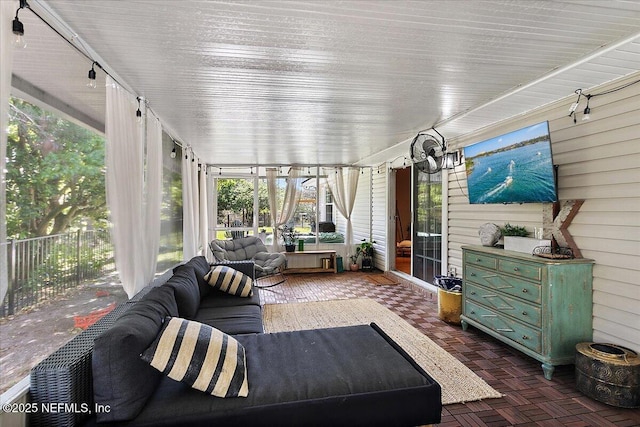 sunroom with track lighting