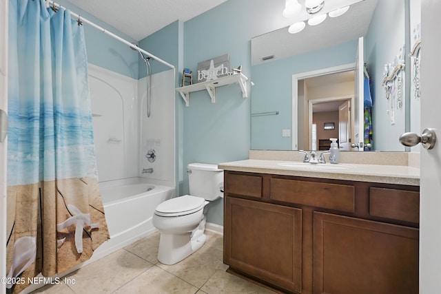 bathroom with toilet, vanity, tile patterned flooring, a textured ceiling, and shower / bath combination with curtain