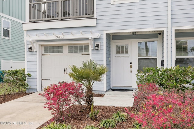 entrance to property featuring a garage