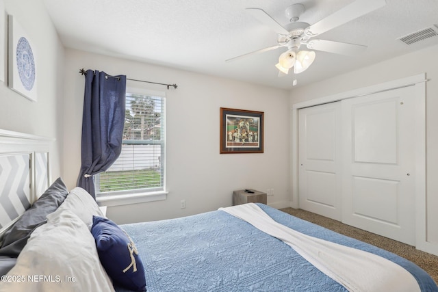 342 4th St N, Jacksonville Beach, FL 32250 - carpeted bedroom with ceiling fan, a closet, and visible vents