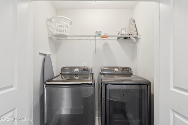 342 4th St N, Jacksonville Beach, FL 32250 - clothes washing area with laundry area and washing machine and clothes dryer