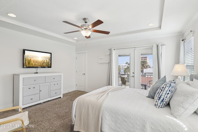 342 4th St N, Jacksonville Beach, FL 32250 - carpeted bedroom with access to exterior, a raised ceiling, multiple windows, and french doors