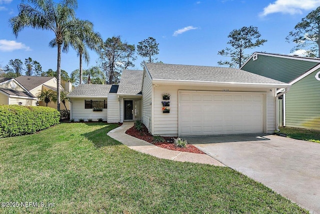 ranch-style house featuring a garage, driveway, a front lawn, and roof with shingles