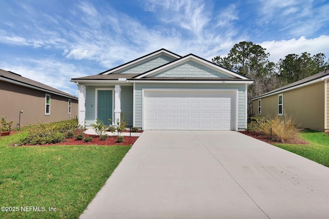 view of front of property featuring concrete driveway, an attached garage, and a front yard