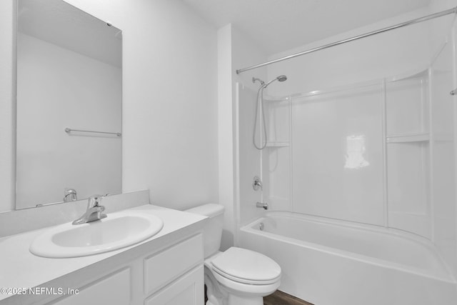 full bath with shower / bathing tub combination, vanity, and toilet