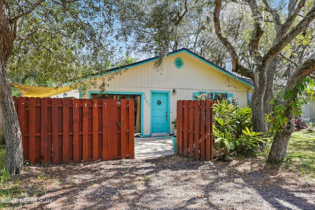 view of outdoor structure with fence