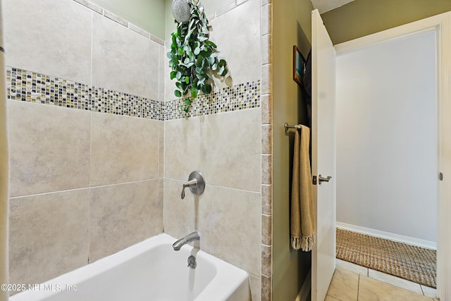 full bath with baseboards, shower / bath combination, and tile patterned floors