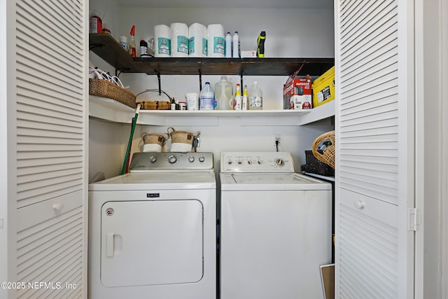 laundry room with laundry area and washer and clothes dryer