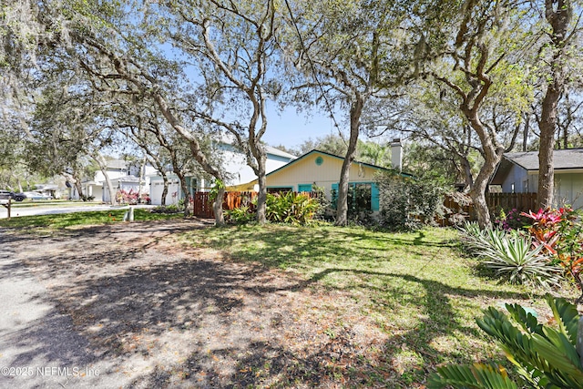 view of yard with fence